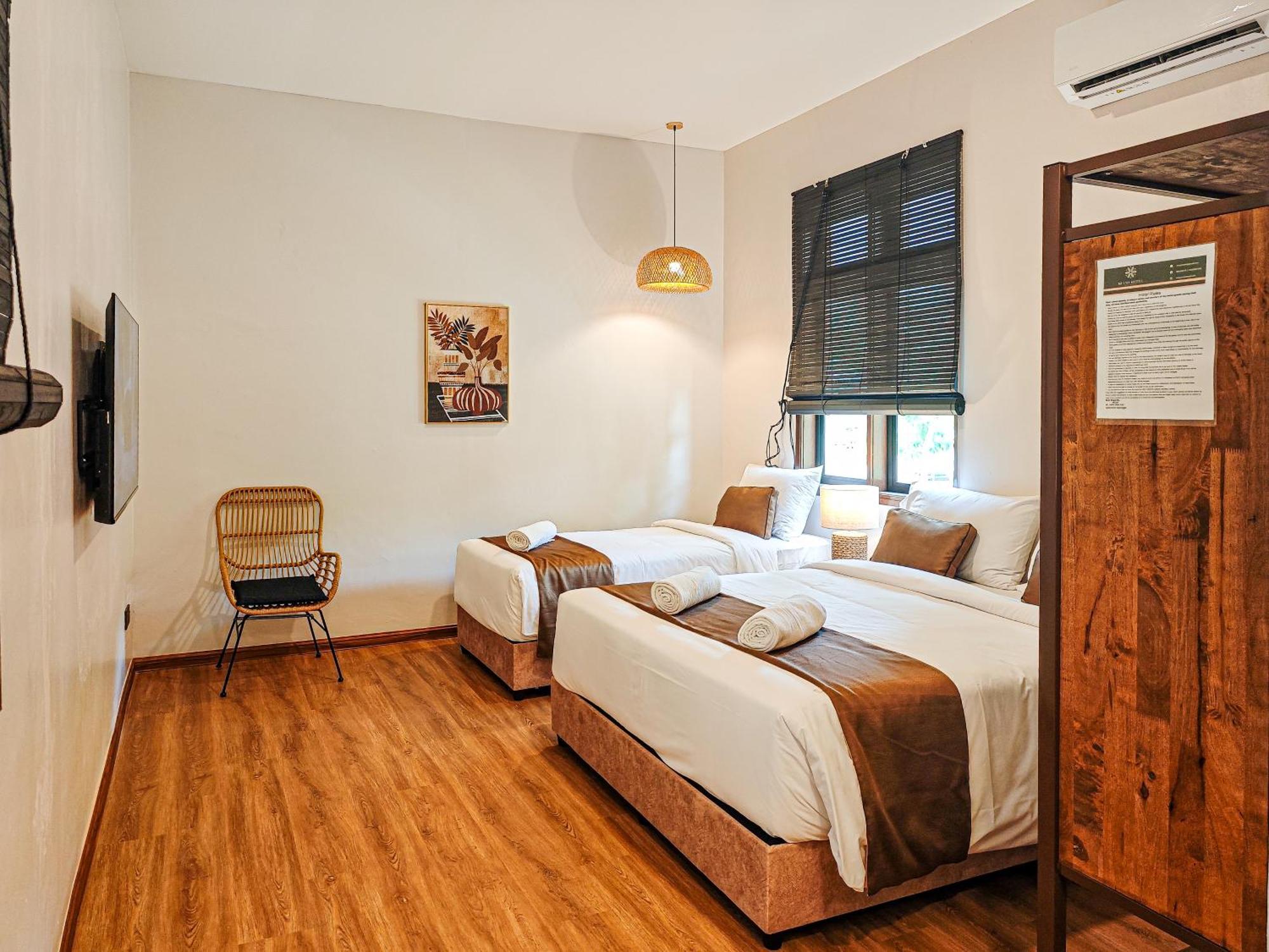 Mulyo Hotel 波德申 外观 照片