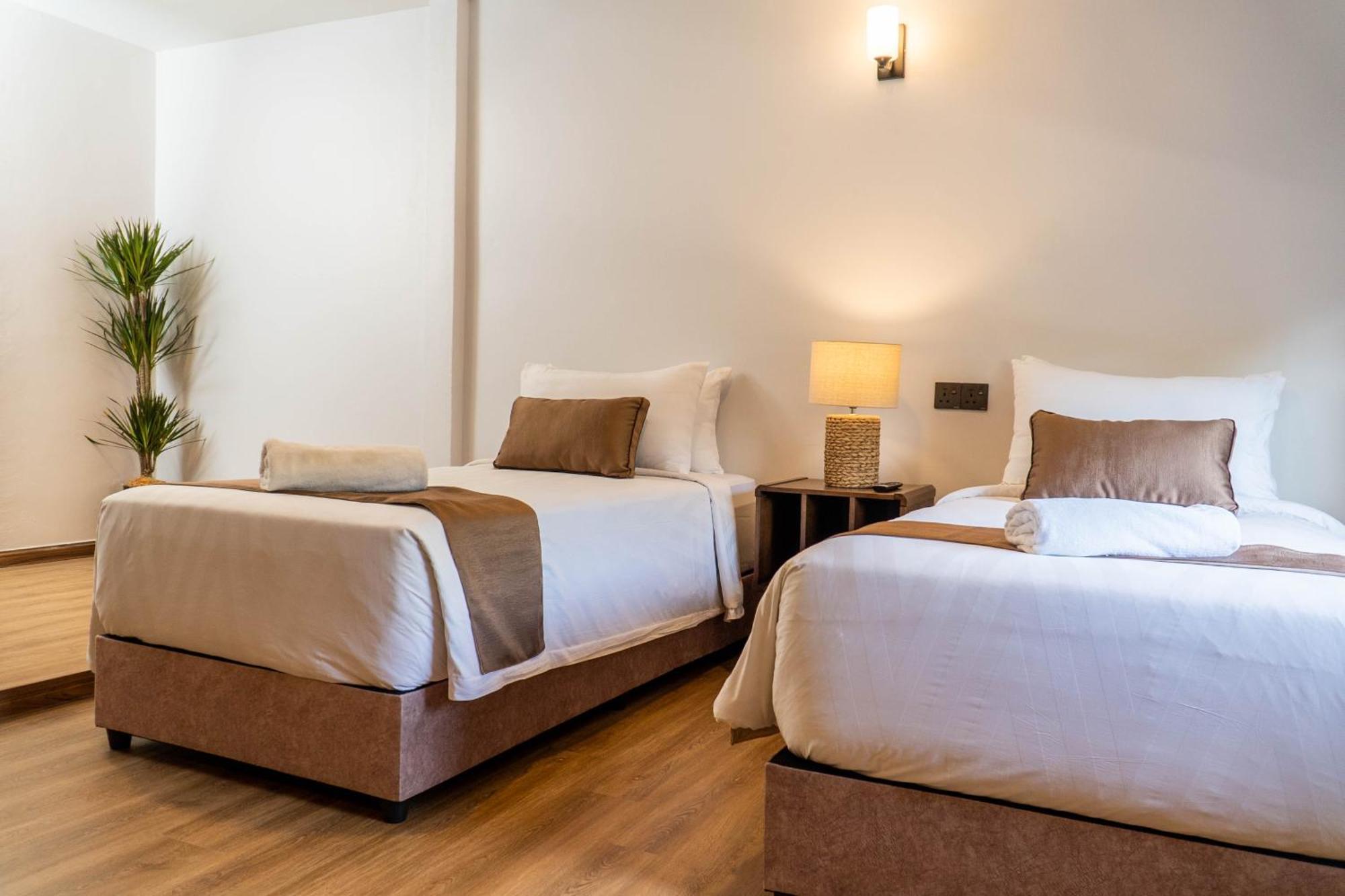 Mulyo Hotel 波德申 外观 照片